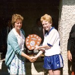 1988 Sony Walsh Tournament (Tony Forristal). Captain John Devlin accepts the shield. Also on right Jim Greene.