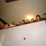 1998 Senior Hurling Champions. Parents and mothers watch the team return to the school hall with the cup.3